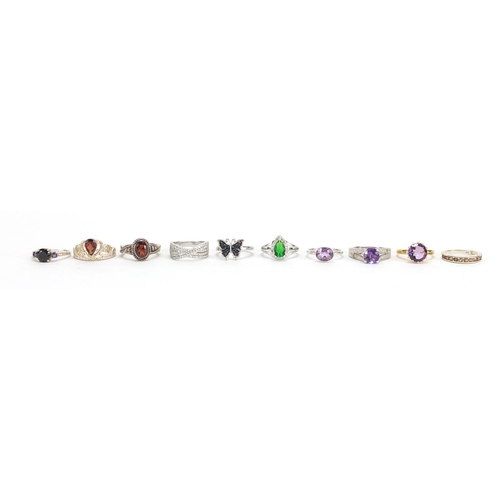 2648 - Ten silver semi precious stone rings one set with diamonds, various sizes, approximate weight 35.4g