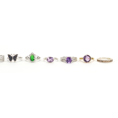 2648 - Ten silver semi precious stone rings one set with diamonds, various sizes, approximate weight 35.4g