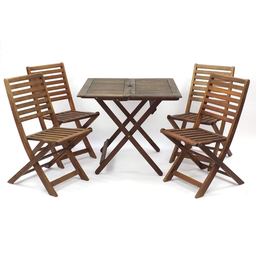 81 - Teak folding garden table and four chairs