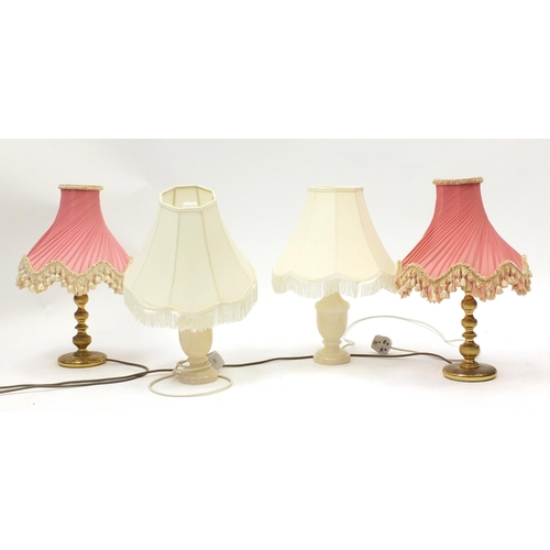 558 - Two pairs of alabaster and brass table lamps with shades