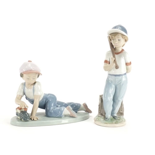 2212 - Two Lladro figures including All Aboard both with boxes, numbered 7619 and 7610, the largest 21cm hi... 