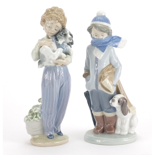 2215 - Two Lladro figures including Winter both with boxes, numbered 5220 and 7609, the largest 21cm high
