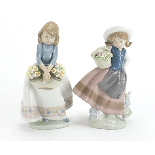 2213 - Two Lladro figurines with boxes, numbered 5221 and 5467, the largest 17cm high