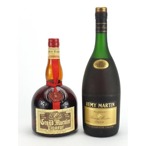 310 - Two bottles of alcohol comprising Grand Marnier Liqueur and Rémy Martin