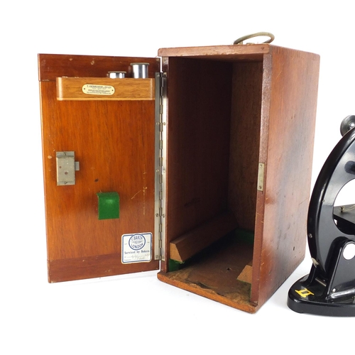 526 - C Baker microscope housed in an oak case with T. Gerrard & Co label