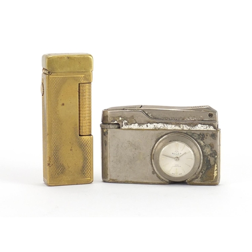 703 - Dunhill gold plated pocket lighter and a Buler lighter watch