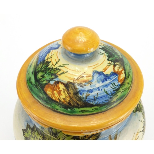 424 - Antique Italian Maiolica jar and cover hand painted with figures in a landscape, inscribed Pesaro to... 