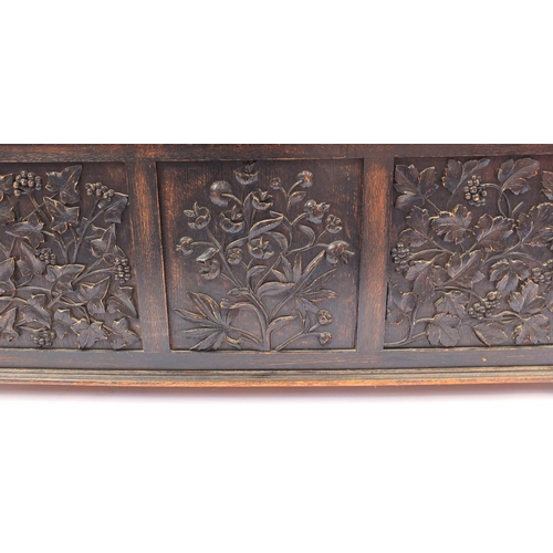 2023 - Oak Settle with floral carved panels and lift up seat, 122cm H x 123cm W x 46cm D