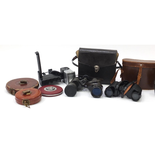 528 - Vintage cameras, binoculars and measuring tapes including Olympia, Hanimex and Denhill