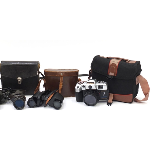 528 - Vintage cameras, binoculars and measuring tapes including Olympia, Hanimex and Denhill