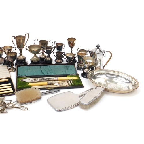 542 - Silver plate including trophies, entrée dish with cover and cutlery