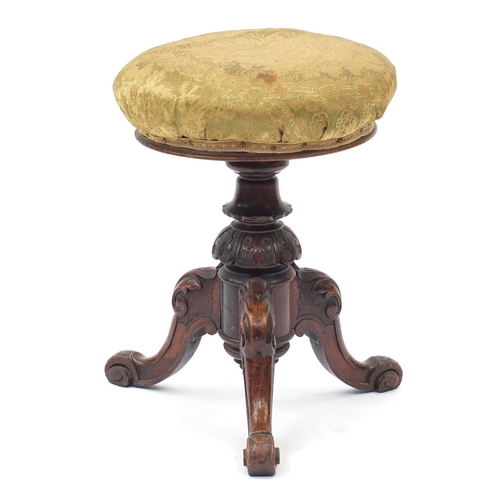 26 - Victorian mahogany adjustable music stool with carved tripod base, 50cm high