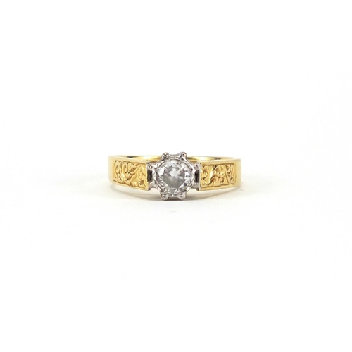 588 - 18ct gold diamond solitaire ring, with engraved shoulders, EF Sheffield 1922, size O, approximate we... 