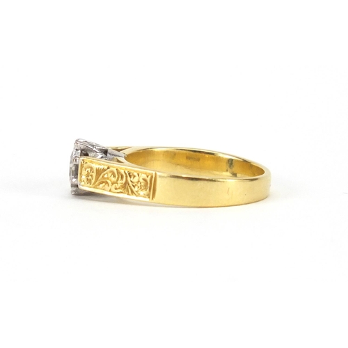588 - 18ct gold diamond solitaire ring, with engraved shoulders, EF Sheffield 1922, size O, approximate we... 