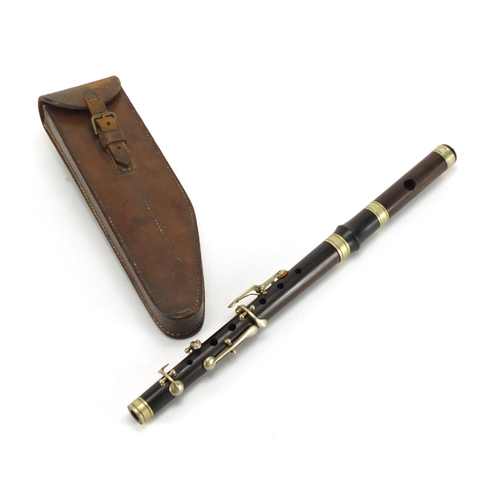 550A - Victorian rosewood two piece flute by Haynes of London, with leather case