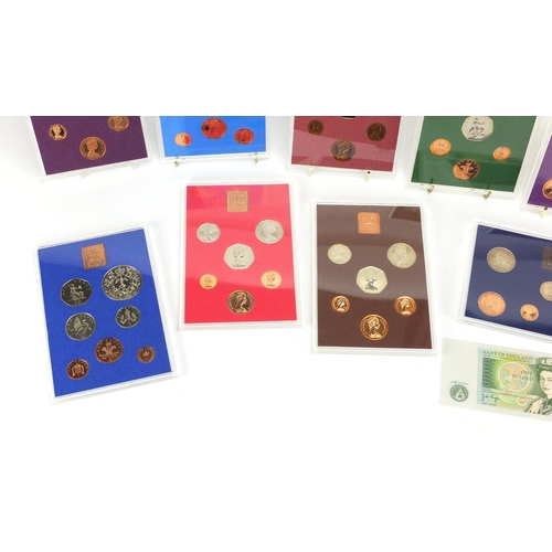 2573 - Thirteen 1970's and 1980's coinage of Great Britain and Northern Ireland proof coin sets with cardbo... 