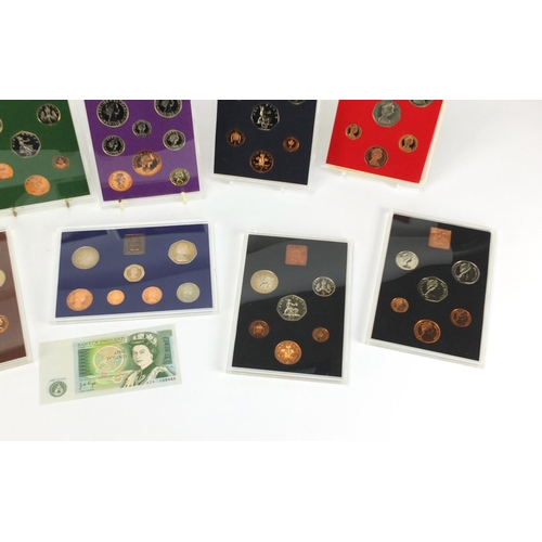 2573 - Thirteen 1970's and 1980's coinage of Great Britain and Northern Ireland proof coin sets with cardbo... 