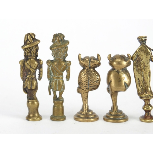58 - Five antique pipe tampers comprising two devil and three figural design examples, the largest 7cm hi... 