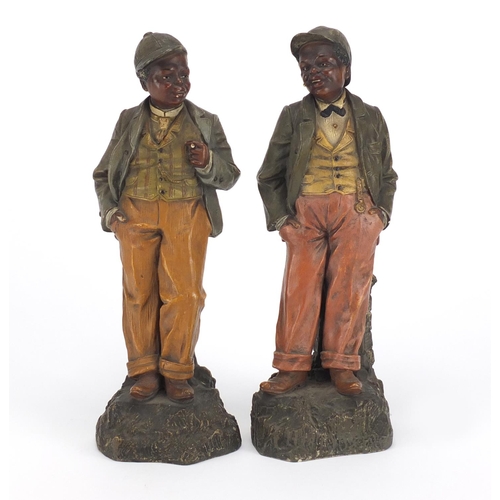 422 - Pair of 19th century hand painted terracotta figures of Blackamoors, each with impressed marks and n... 