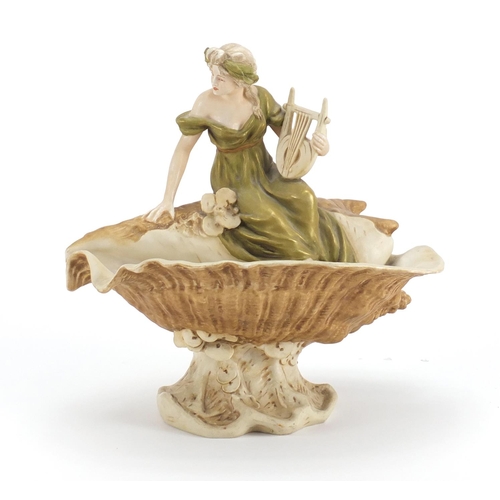 477 - Royal Dux centre piece of a maiden playing a harp seated on a shell, factory marks and numbered 1932... 
