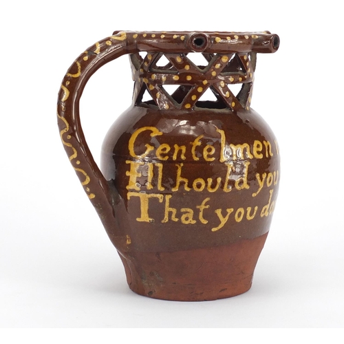 241 - 19th century Slip Ware puzzle jug, 18cm high
