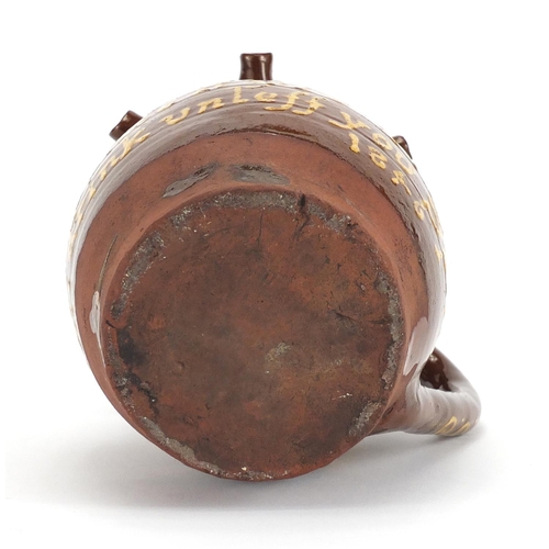 241 - 19th century Slip Ware puzzle jug, 18cm high