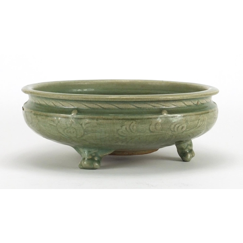 251 - Chinese celadon glazed tripod incense burner, incised under glaze with foliage, 28.5cm in diameter