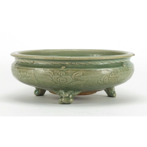 251 - Chinese celadon glazed tripod incense burner, incised under glaze with foliage, 28.5cm in diameter