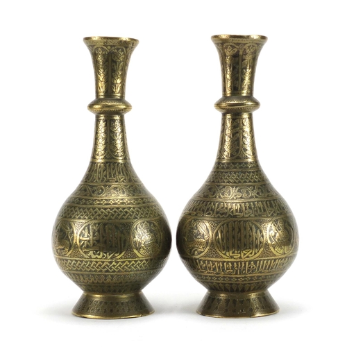 353 - Pair of 19th century Persian bronze vases, engraved with script, animals and flowers, each 30cm high