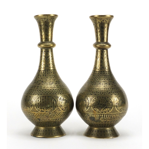 353 - Pair of 19th century Persian bronze vases, engraved with script, animals and flowers, each 30cm high