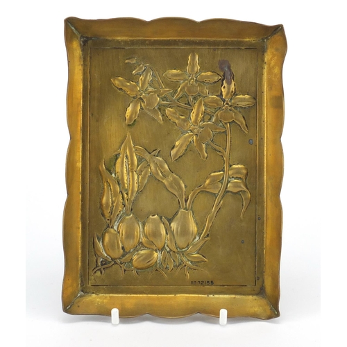 704 - Arts & Crafts brass dish embossed with stylised flowers, RD number 92155, 15.5cm in length