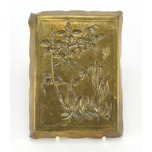 704 - Arts & Crafts brass dish embossed with stylised flowers, RD number 92155, 15.5cm in length