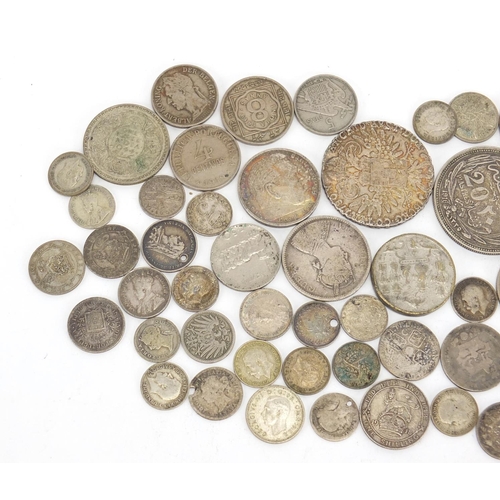 612 - Antique and later World coins including Maria Theresa Thaler, dollars and three penny bits