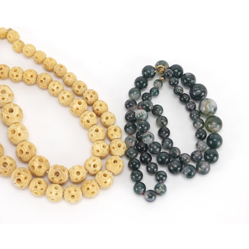 673 - Bead necklaces comprising carved bone, moss agate and Lapis Lazuli