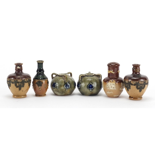 643 - Six miniature Doulton stoneware vases and sifter, the largest 7cm high