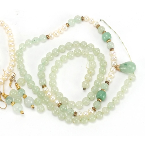 387 - Two jade and pearl necklaces and a pair of earrings