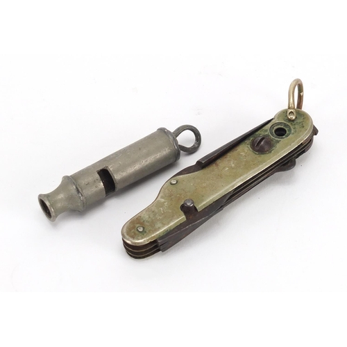 700 - Antique folding multi tool and a police whistle