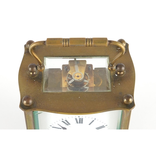 2283 - French brass cased carriage clock with enamel dial and Roman numerals, 11.5cm high