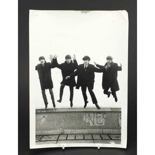 117 - Vintage black and white photograph of The Beatle's, 30.5cm x 22cm