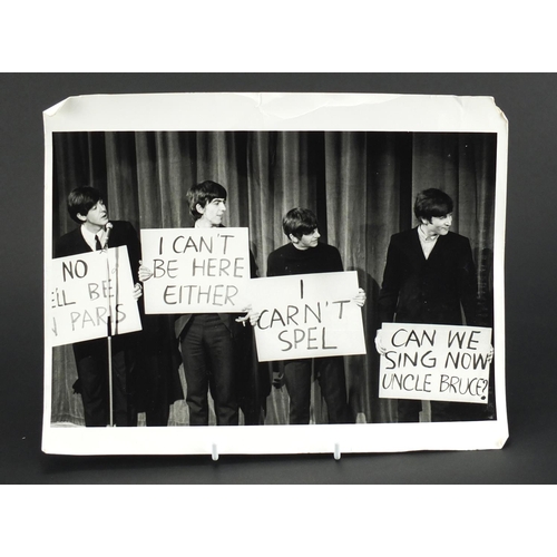 116 - Vintage black and white photograph of The Beatle's, 30.5cm x 22cm