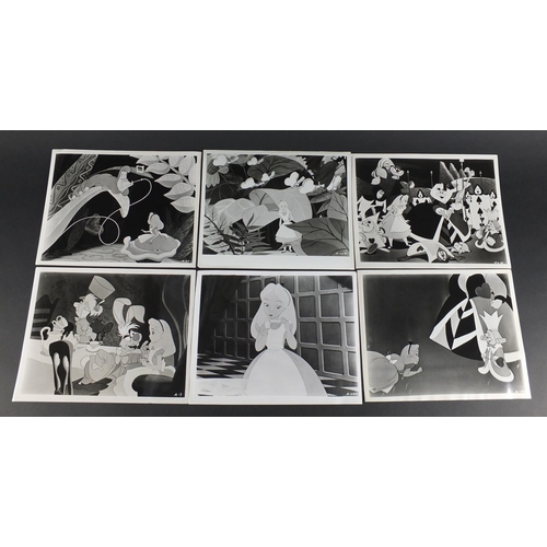 119 - Six vintage Alice in Wonderland black and white  photographs each with R K O Radio stamps to the rev... 