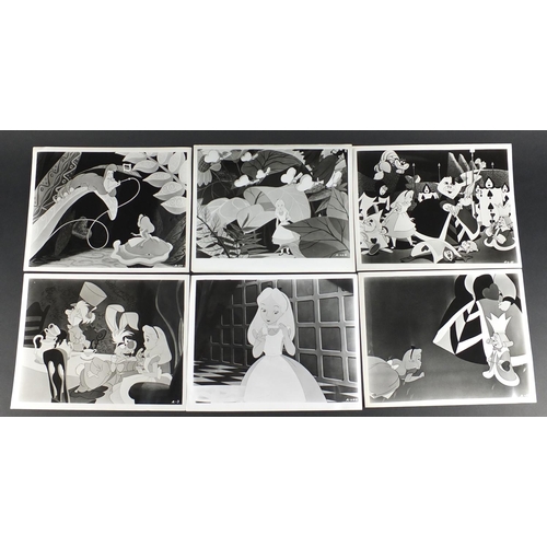119 - Six vintage Alice in Wonderland black and white  photographs each with R K O Radio stamps to the rev... 