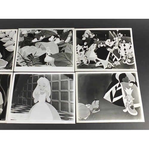 119 - Six vintage Alice in Wonderland black and white  photographs each with R K O Radio stamps to the rev... 