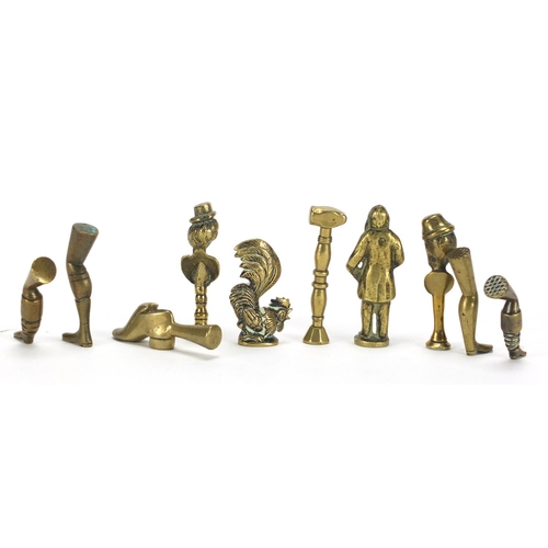 67 - Ten antique pipe tampers including boot, leg, cockerel and figural design examples, the largest 6.5c... 