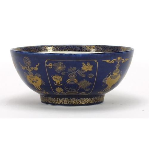 196 - Chinese porcelain powder blue bowl, gilded with objects, 29cm in diameter