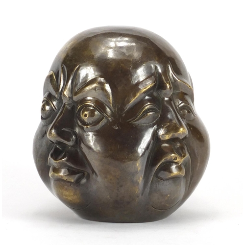 2332 - Chinese bronze four face buddha paperweight, character marks to the base, 12cm high