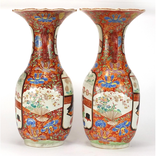 278A - Pair of Japanese Arita porcelain vases with twin handles, each hand painted with figures and flowers... 