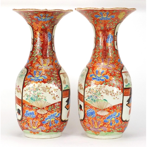 278A - Pair of Japanese Arita porcelain vases with twin handles, each hand painted with figures and flowers... 