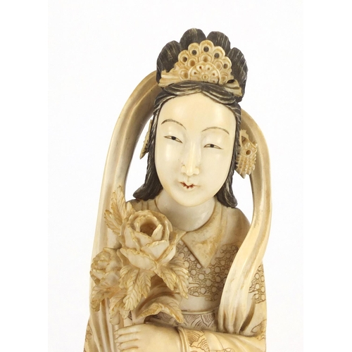 318 - Good Japanese carved ivory Okimono of a Geisha holding a basket and flowers, character marks to the ... 