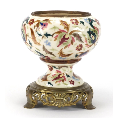 483 - Hungarian oil lamp base by Zsolnay Pecs, the base hand painted with stylised flowers raised on a cas... 